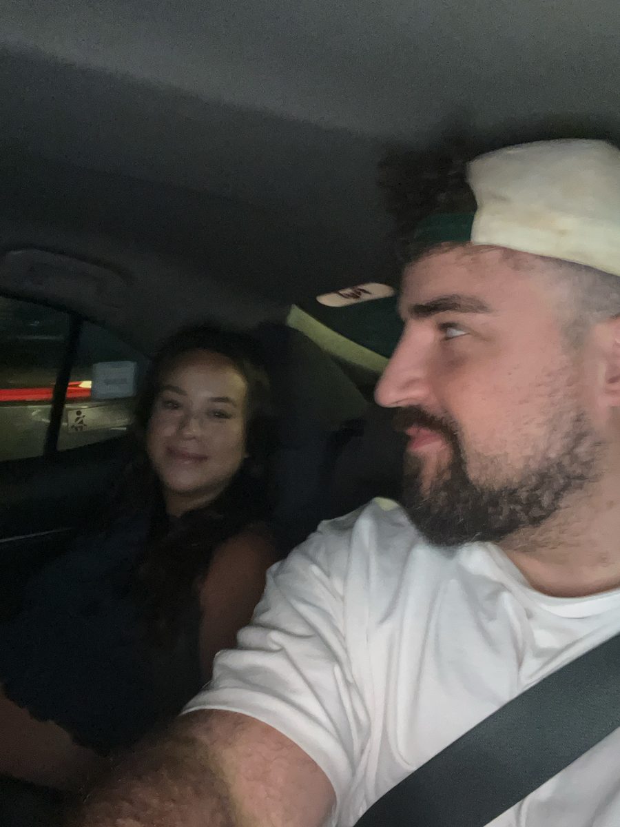 Two people in a car at night